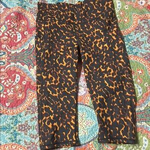 Fabletics Orange and Black Leopard Print Leggings